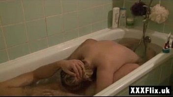 2 lesbian girls kissing wild sucking tongues in the bath