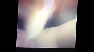 asian girl getting her hairy pussy fucked with vibrator and strapon on the bed in the room